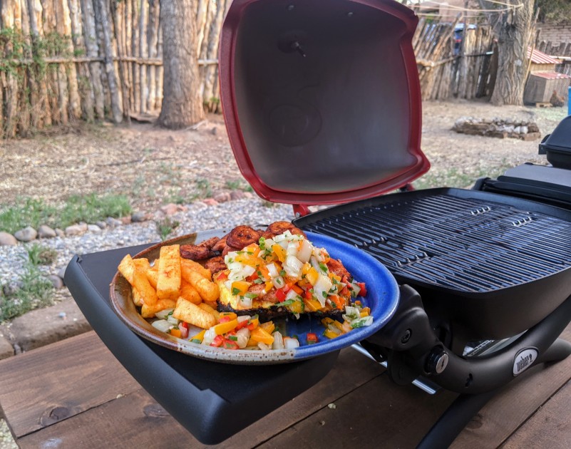 weber q 1200 - a colorful meal of chili-pineapple, maduros, and fresh grilled fish...