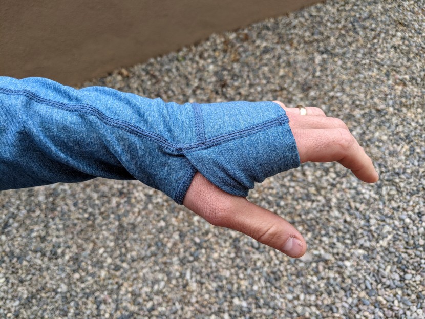 thumb loops make it easier to pull on mid-layers. and when you...