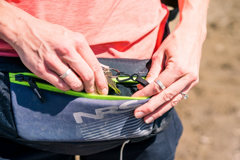 nrs zephyr - a large padded front pocket can hold a smartphone and car keys.