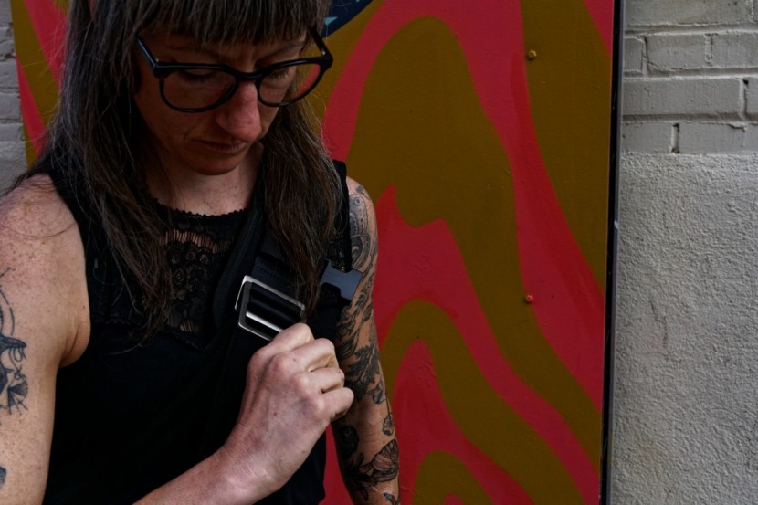 mission workshop monty - with a large shoulder strap and an easy mechanism for tightening and...