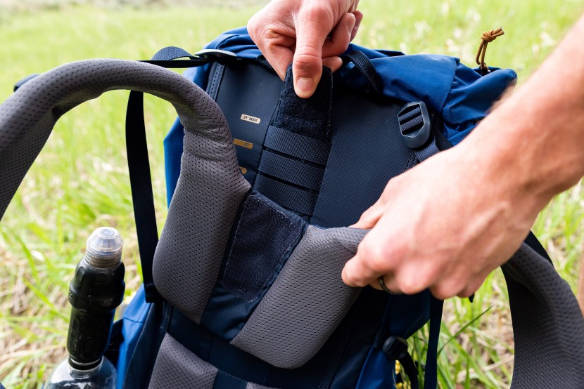 rei co-op trailbreak 60 - adjusting the packs torso length is a accomplished by rethreading...