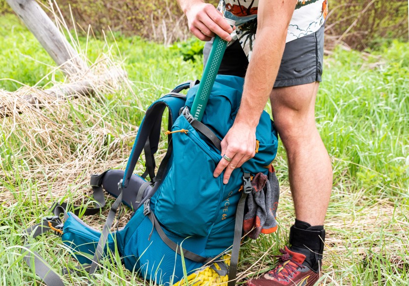 kelty coyote 65 - the pass through side pockets work well for storing tall items like...