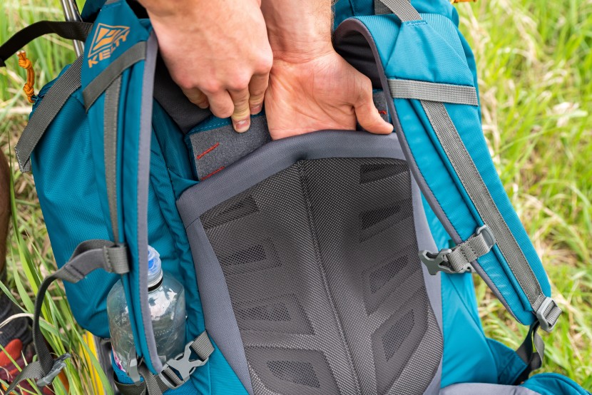 kelty coyote 65 - simply separate the velcro panel and you are ready to adjust.