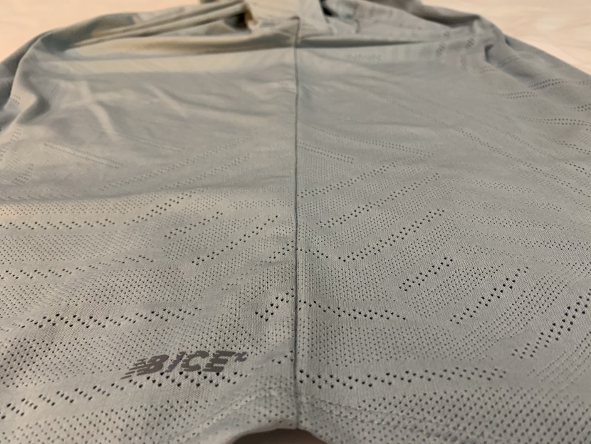 new balance q speed fuel jacquard - a reflective logo on the chest and by the left hip are the extent of...