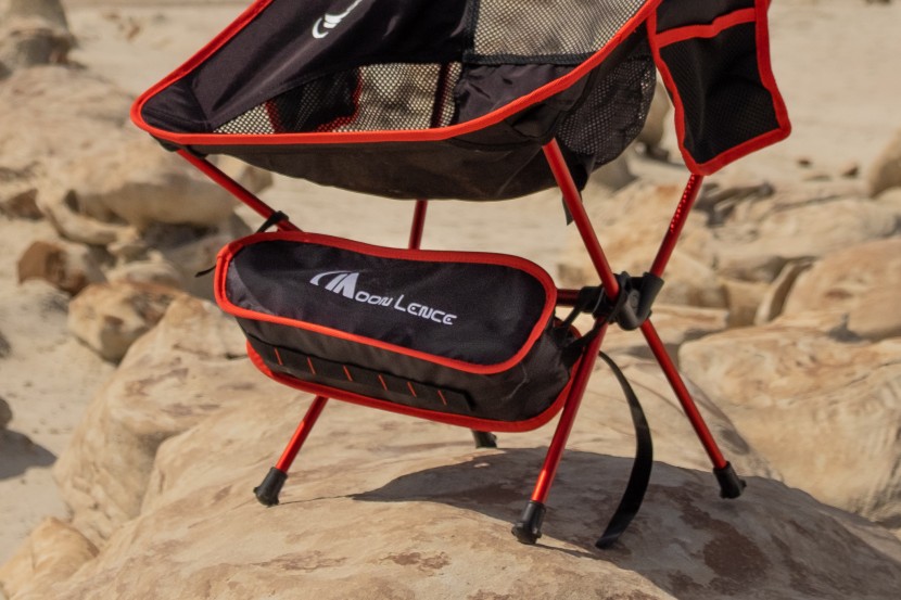 moon lence camp chair - in addition to the side pocket, the chair's storage bag has loops on...