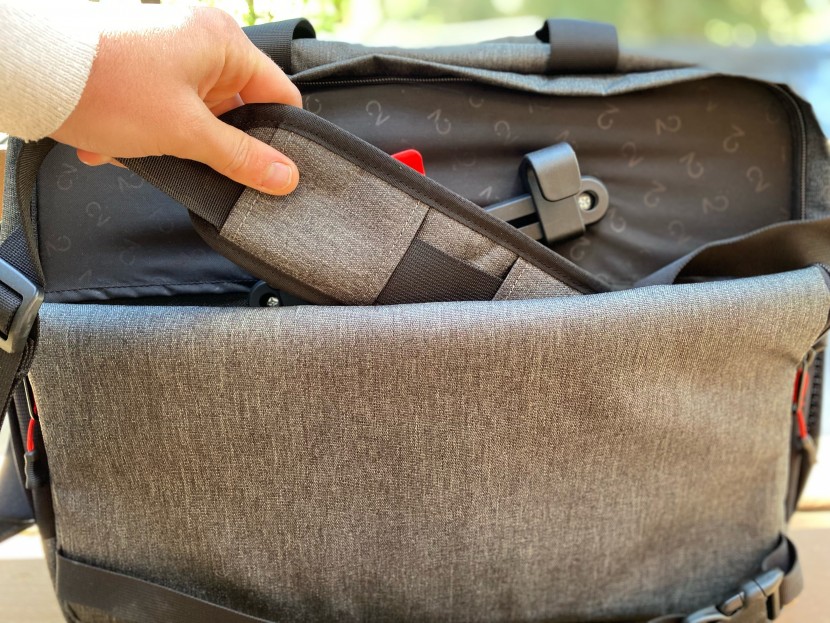 two wheel gear laptop messenger bag - the messenger strap tucks in quite easily to the folded back panel.