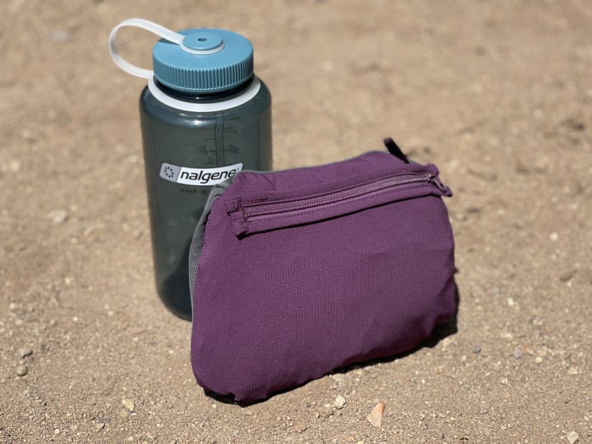 outdoor research helium wind hoody for women - packed up into its single zippered pocket.