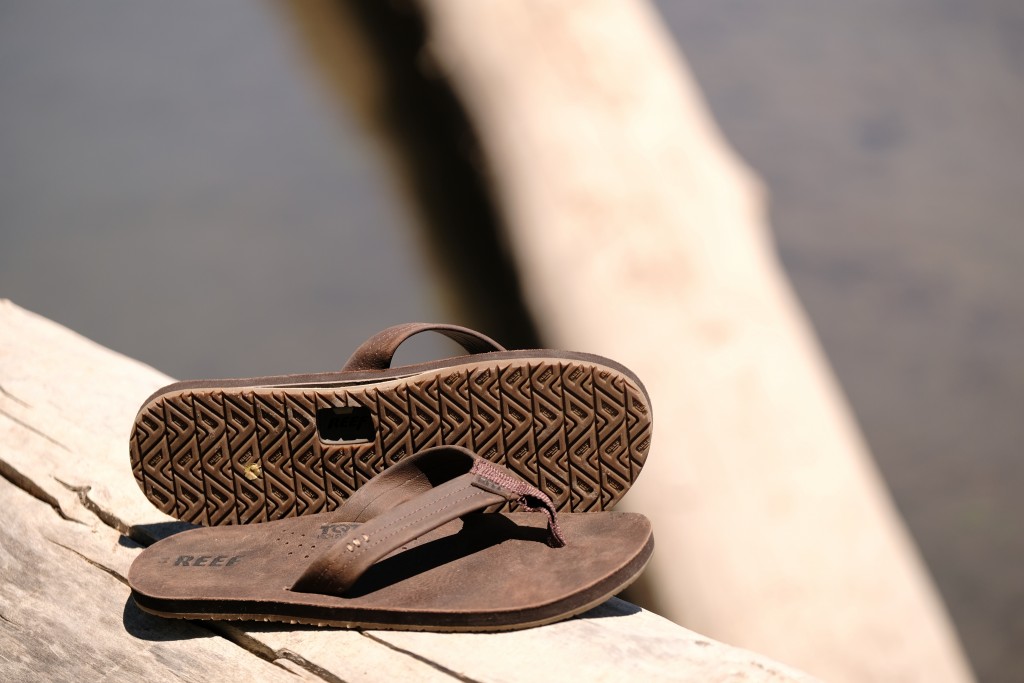 reef draftsmen - a well-put-together, stylish flip flop with a fun party-piece bottle...