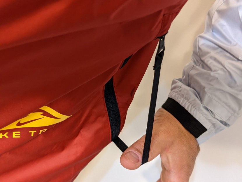 nike trail windrunner - a neat idea in theory, but these pull cords get caught on everything.