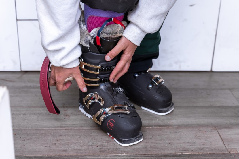 rossignol pure pro heat for women - the rose gold buckles on the pure pro heat are flashy but functional.