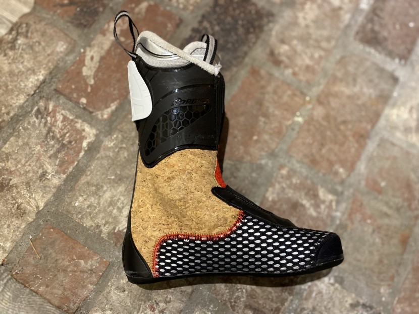 the race style liner uses traditional cork lining in the heel and...