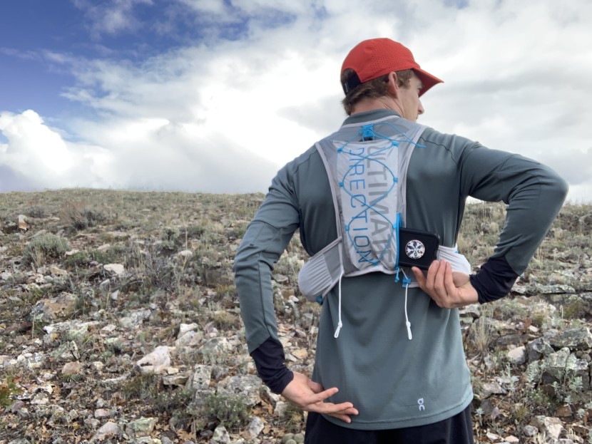 ultimate direction race vest 5.0 - the back zippered pocket is big enough to store an oversized phone...