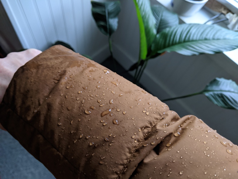 rei co-op norseland insulated parka - we're impressed by how well this jacket shed water in the shower test.