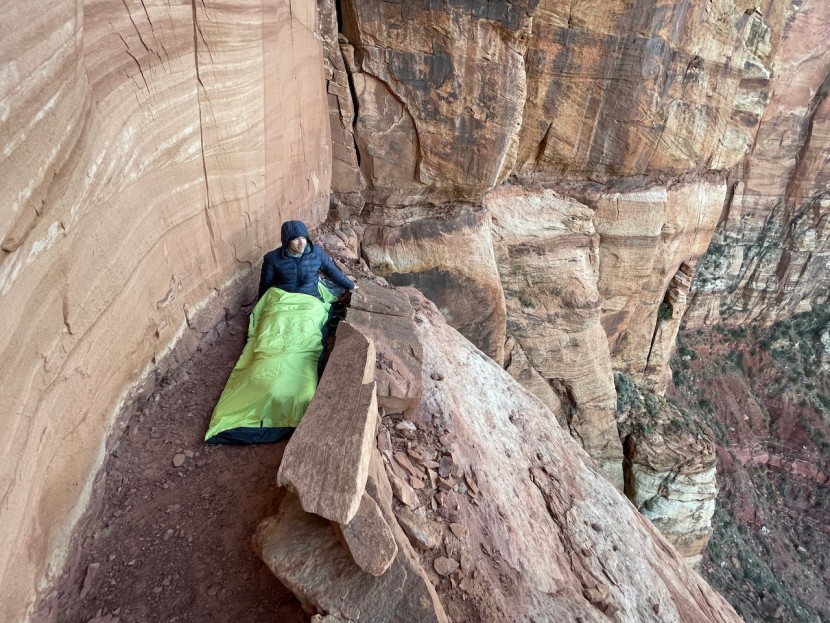 bivy sack - waking up warm and dry on an exposed bivy ledge in zion national park.