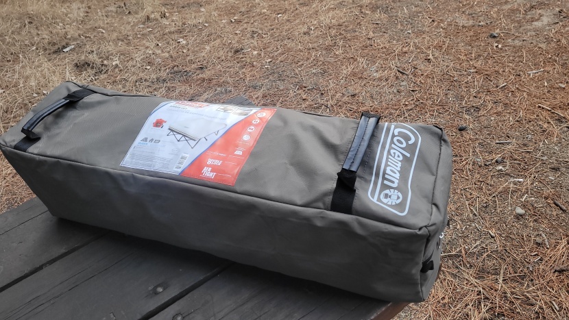 the airbed cot packed up in its carrying case.