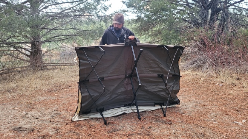 this cot is large enough that a second person can be helpful but it...