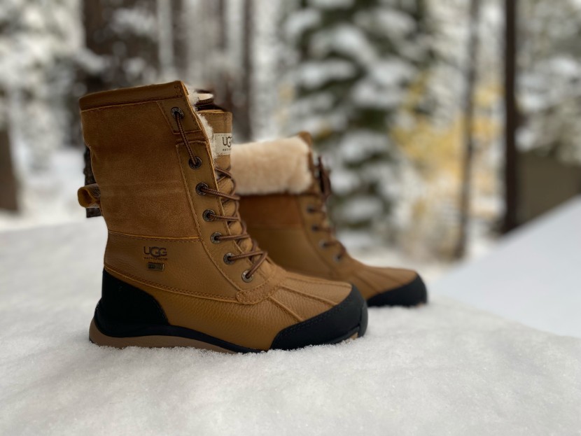 the collar of the ugg adirondack can be rolled down to expose the...