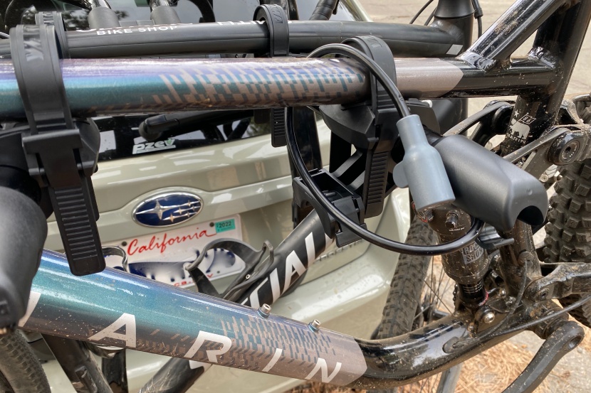 yakima fullback 2 - the cable lock slides out of the end of the support arm and loops...
