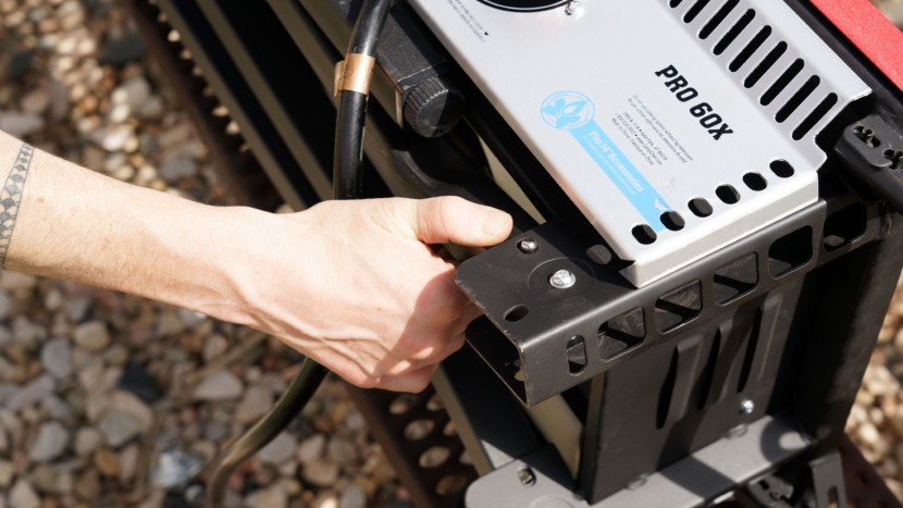 to swing the legs open, you press the silver button to the right of...