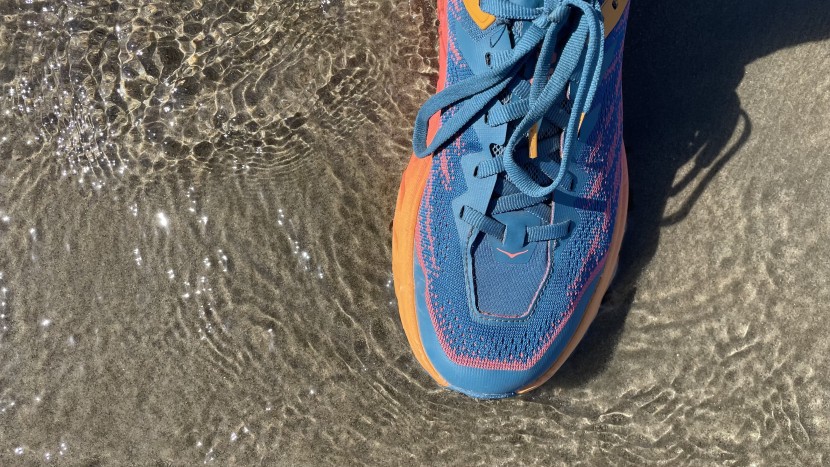 hoka speedgoat 5 for women - the mesh upper definitely let water in, but the stack height...