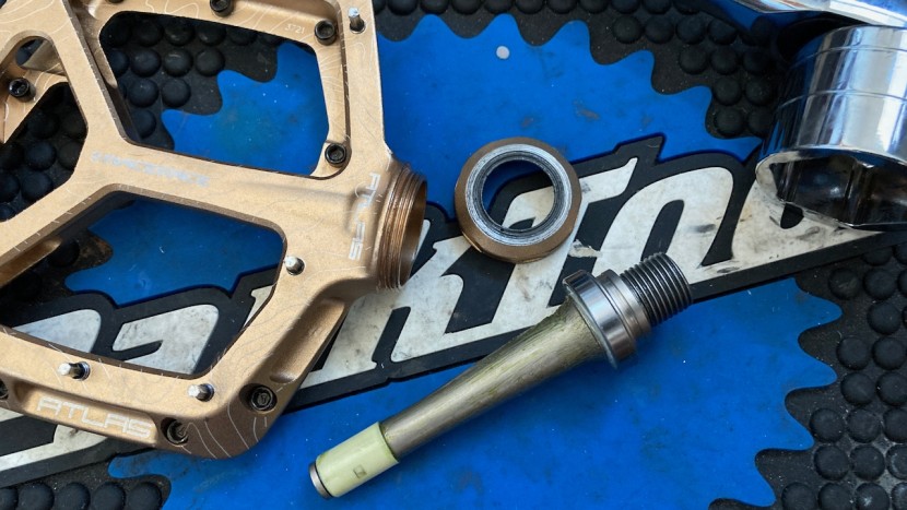 mountain bike flat pedals - once the cap is removed the axle of the atlas pulls away from the...