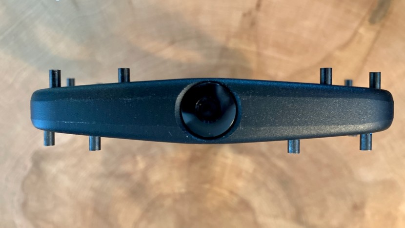 pnw loam pedal - the pedal body has a convex shape but the pins are a concave shape.