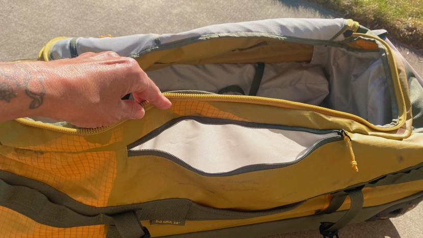 a useful exterior side pocket on the rei co-op big haul rolling...