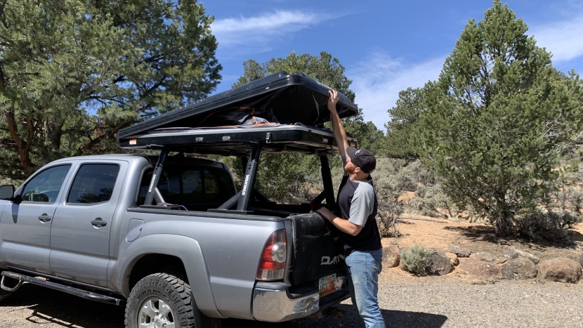 rooftop tent - setting up a hardshell tent is as easy as opening the trunk of a...