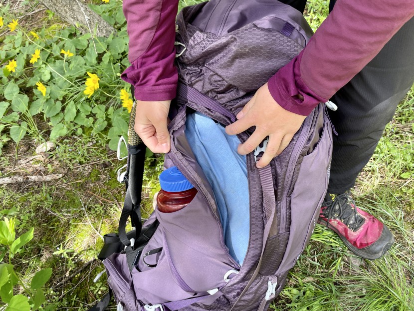 osprey aura ag 65 - though we wish this was a u-zip, the side zip access to the stuff...