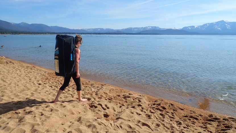 the flyweight bag features side and top carrying handles, as well as...