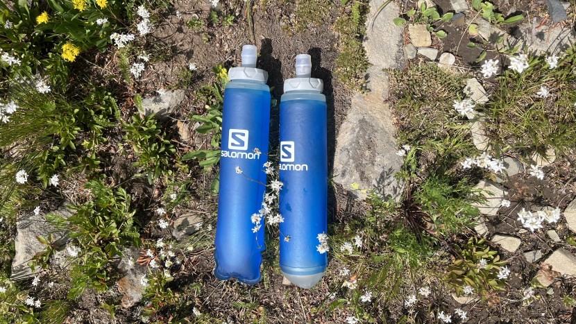 salomon sense pro 5 - the soft flask that is included with the vest is on the right, with...