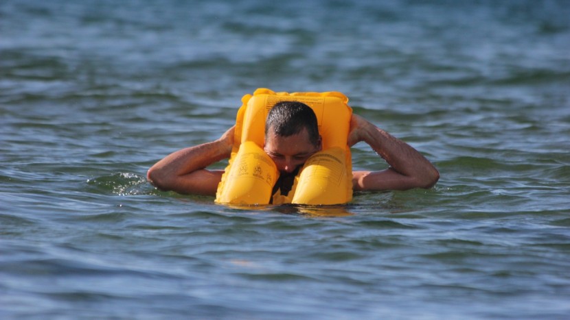 life jacket - because it can be difficult to actually put on an inflated vest...