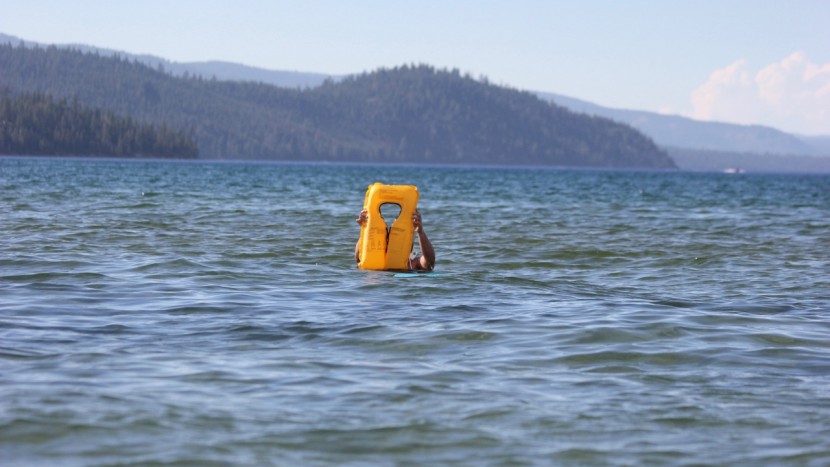 putting on the inflated pfd while keeping yourself afloat is not the...