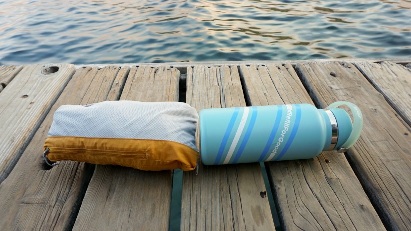 rei rainier for women - the rainier packed up next to a 1-liter hydroflask.