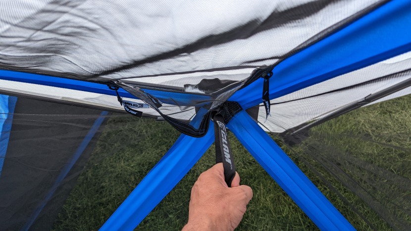 canopy tent - setting up the  quick-set escape is a simple as pulling on a few...
