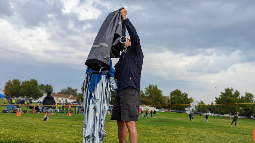 the e-z up's roller bag easily pulls away from the canopy, leaving...
