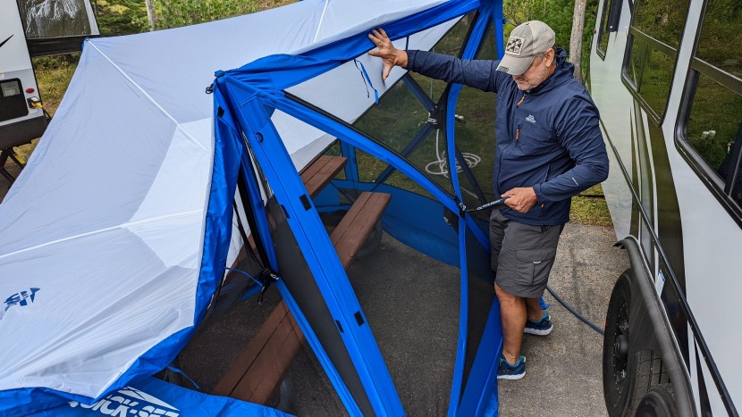 simply walk around the edges, find the handle attached at each one...