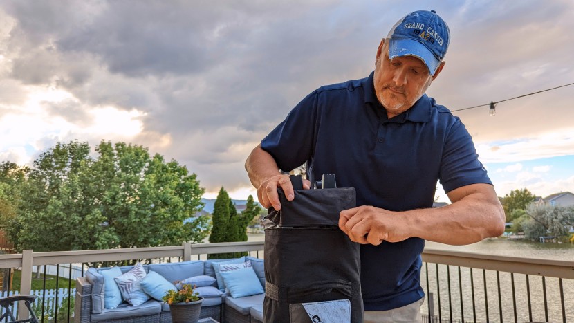 the first step for setup is unzipping the roller bag to expose the...