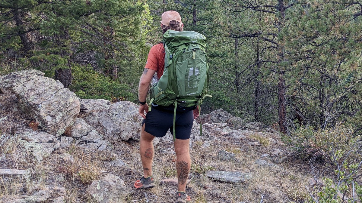 Osprey Atmos 65 AG Review (Testing the Osprey Atmos 65 on a downhill scramble in Colorado.)