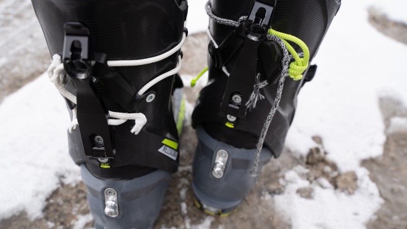 dynafit mezzalama - on the right, the stock string in grey and showing sheath damage. on...