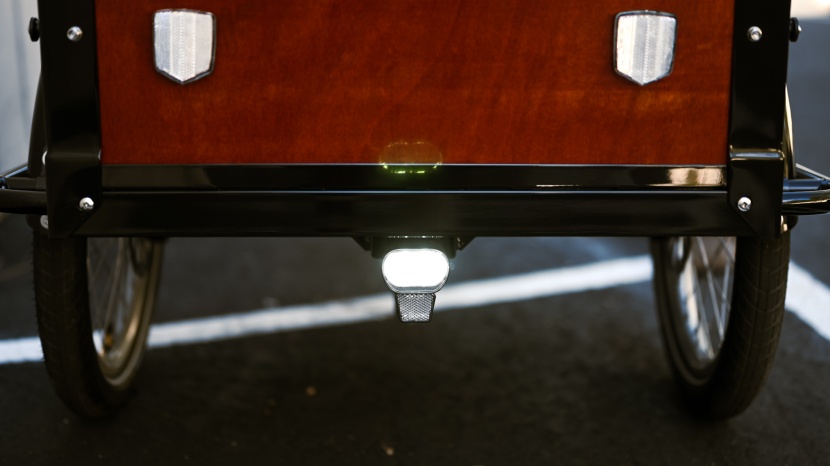 the front headlight is located lower than most headlights. the two...