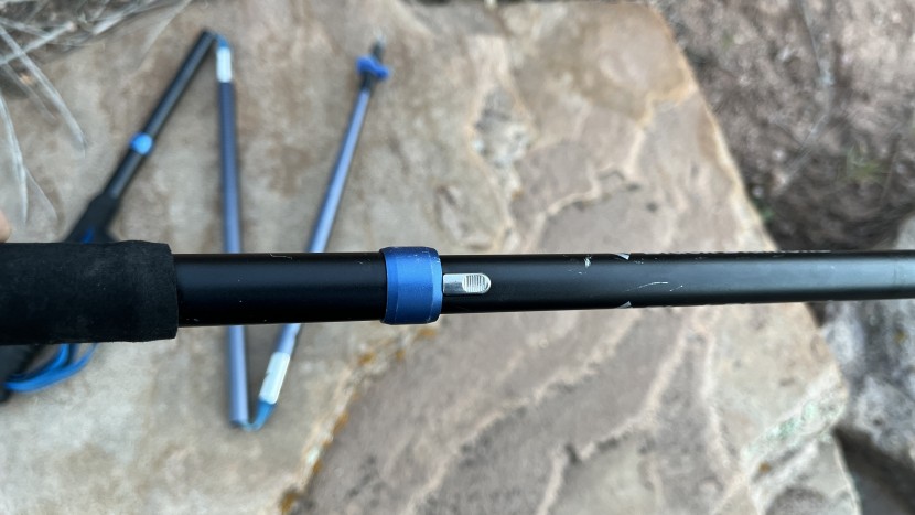 black diamond distance z - the locking mechanism is a small metal button that is textured and...