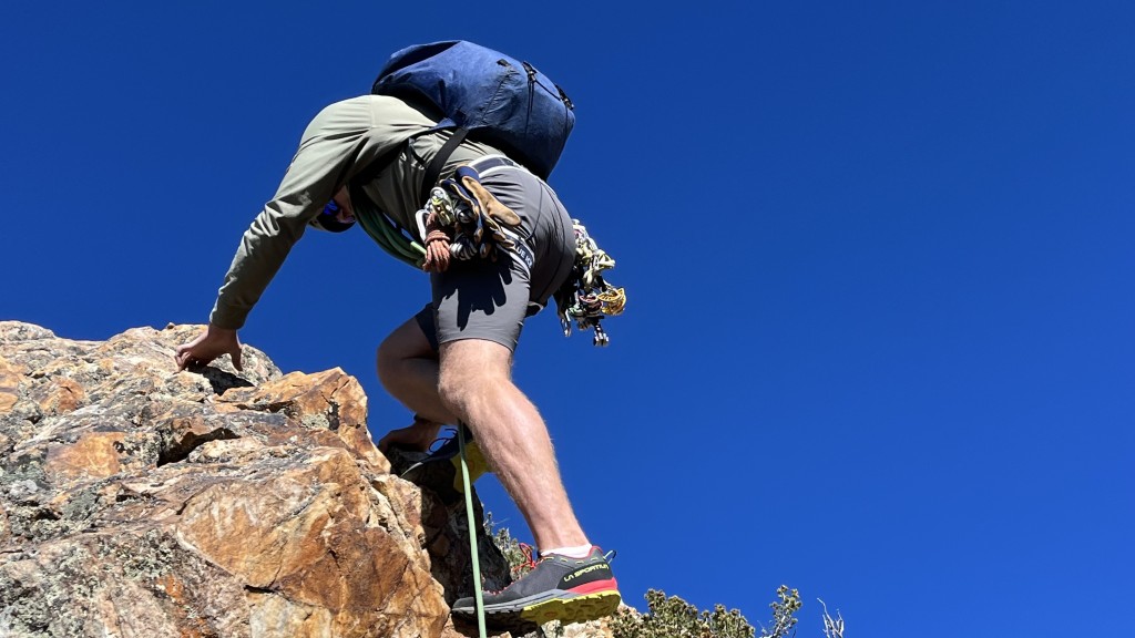 blue ice choucas light - scrambling over low 5th-class rock in the choucas light.