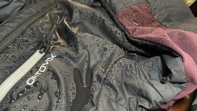 insulated jacket womens - testing the water resistance of these jackets is an important part...