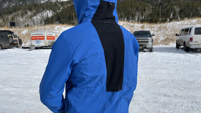 a stretchy back panel allows a break in the gore-tex shell in a...