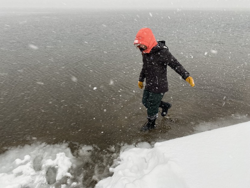 winter boots womens - wading through cold lake waters to test our boot's waterproofness.