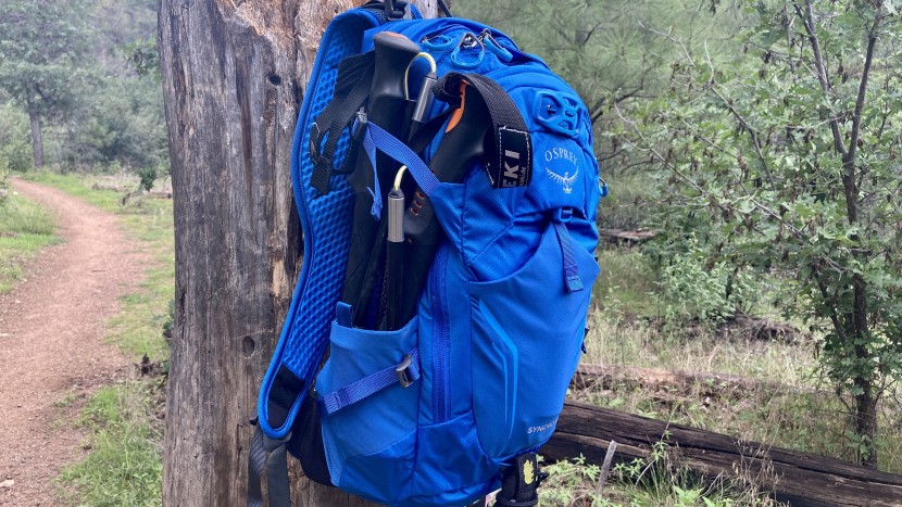 the side pockets and compression straps can be used to carry hiking...