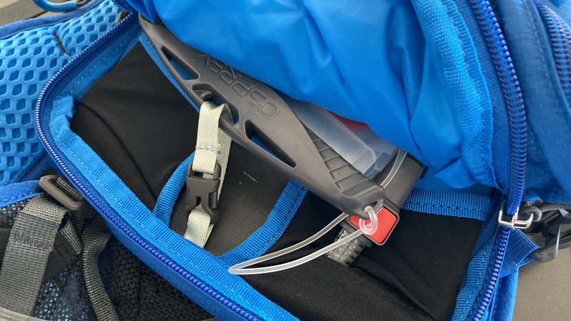 osprey syncro 12 - the reservoir pocket features a nylon clip to ensure the bladder...