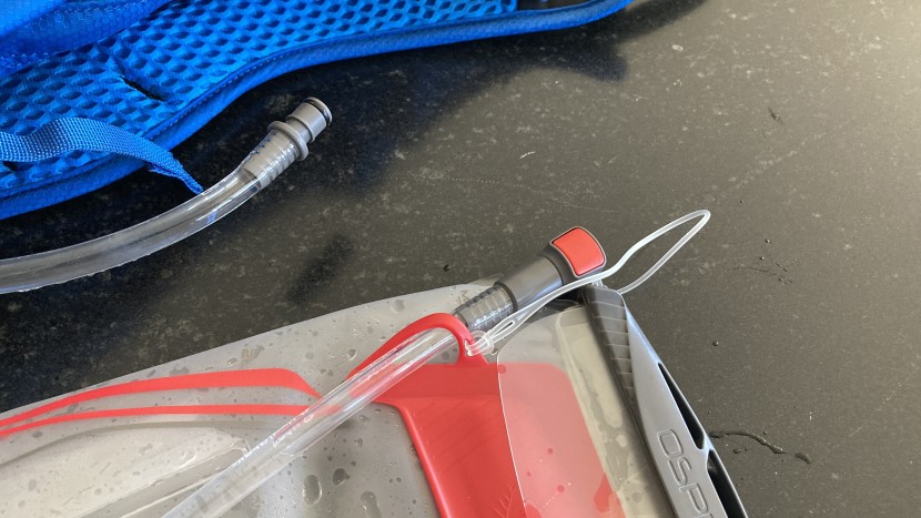 osprey syncro 12 - the hydrapak bladder features a quick disconnect button for the...