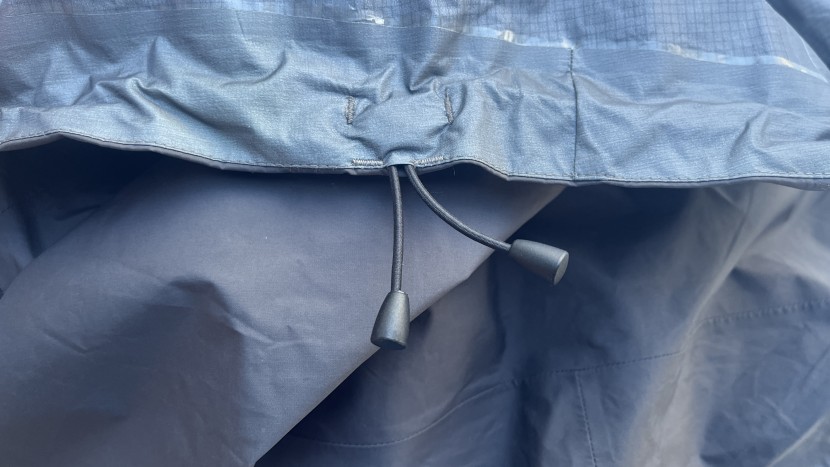 hardshell jacket - the lhotse's hem drawcords don't form a loop, which is nice for...